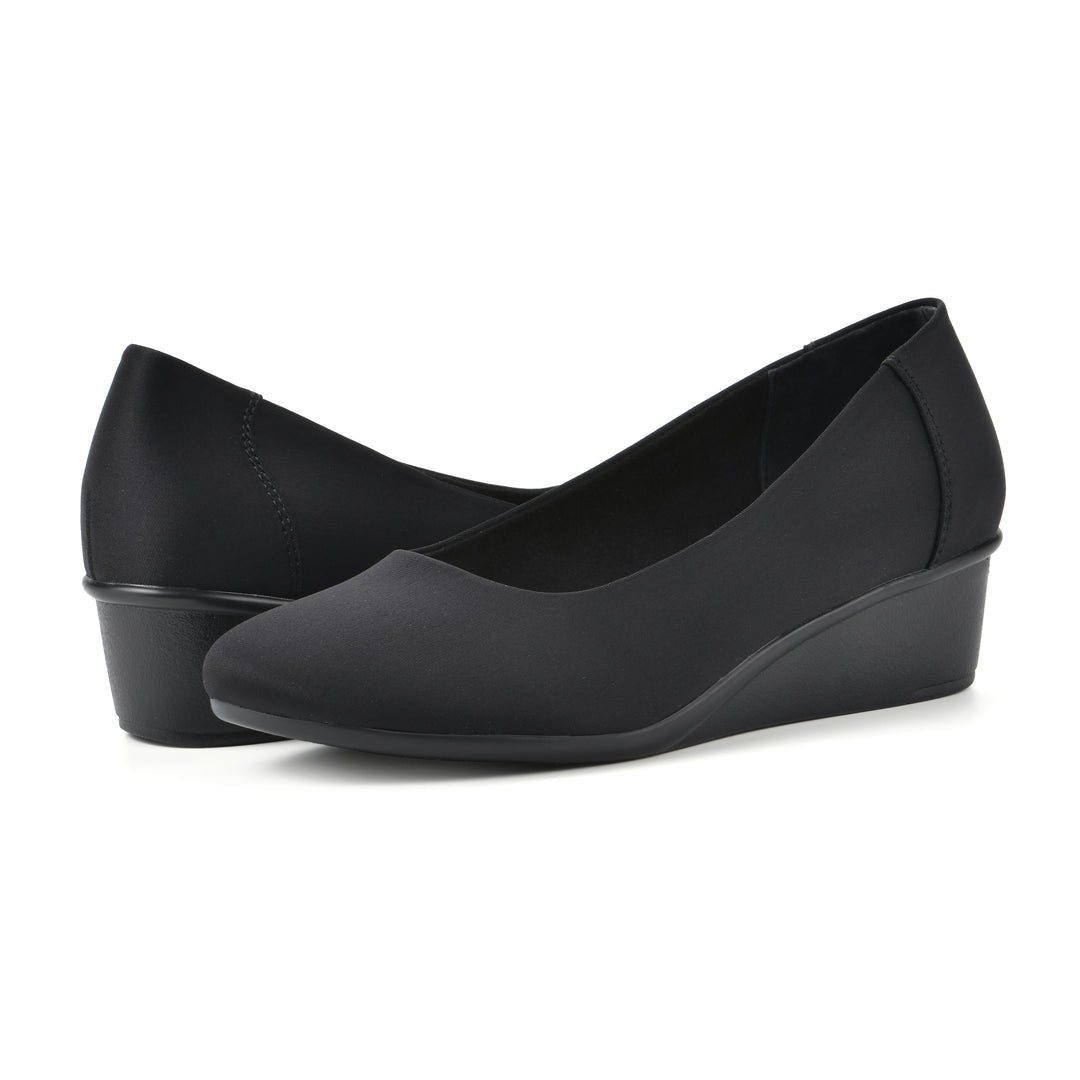 Angle view of a pair of low, black, fabric wedges with black sole