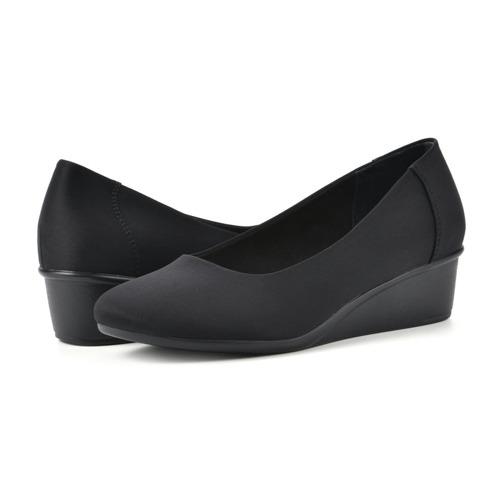 Angle view of a pair of low, black, fabric wedges with black sole