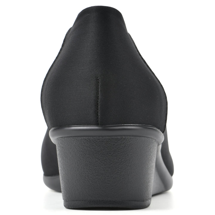 Rear view of a low, black, fabric wedge with black sole