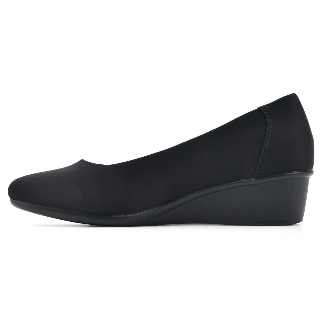 Side view of a low, black, fabric wedge with black sole