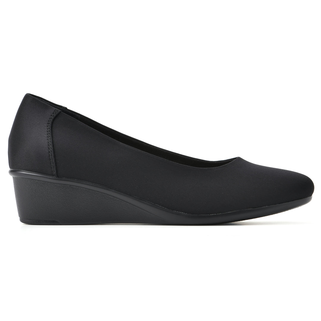 Side view of a low, black, fabric wedge with black sole