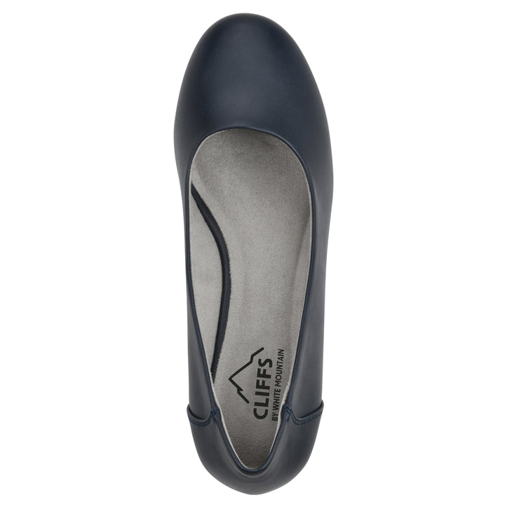 Top view of a low, navy, faux leather wedge with black sole