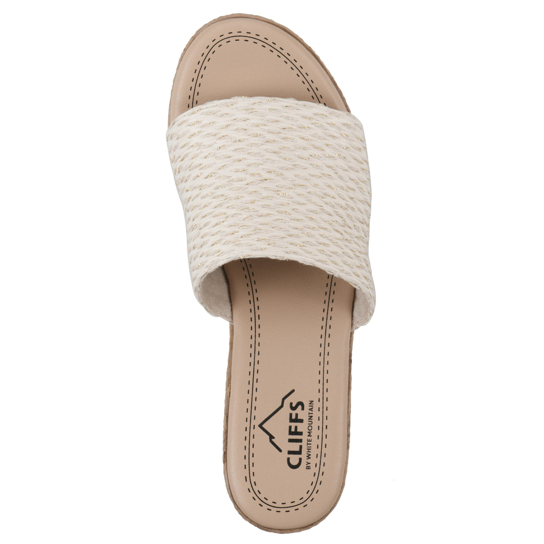 Top view of a white and gold threaded fabric wedge sandal with a braided rope-style sole