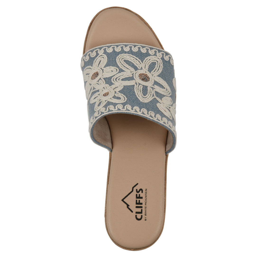 Top view of a denim wedge sandal with cream embroidered floral pattern and a braided rope-style sole
