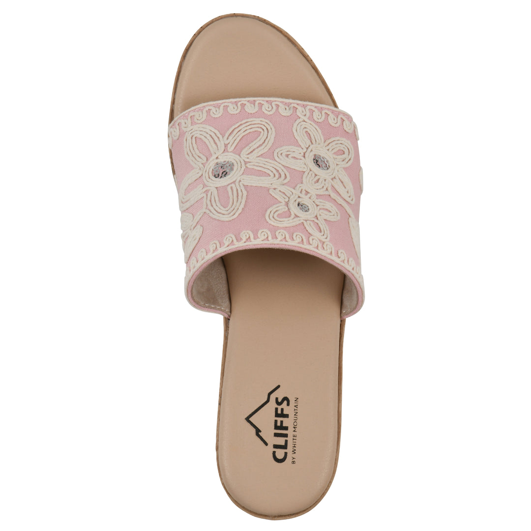Top view of a pale pink wedge sandal with cream embroidered floral pattern and a braided rope-style sole