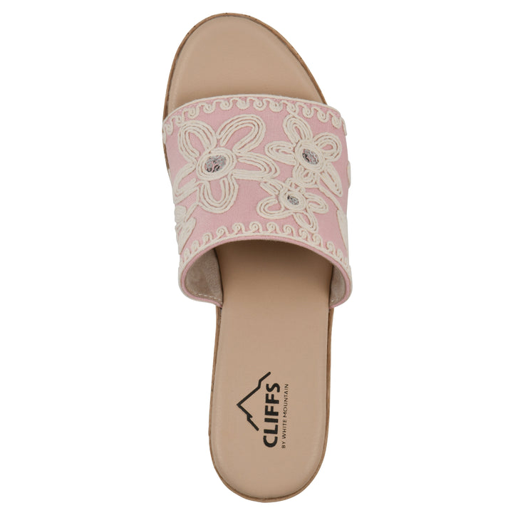Top view of a pale pink wedge sandal with cream embroidered floral pattern and a braided rope-style sole