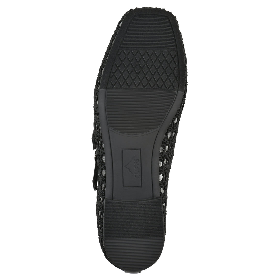 Sole view of a black mesh ballet flat with double adjustable mini straps and a black sole 