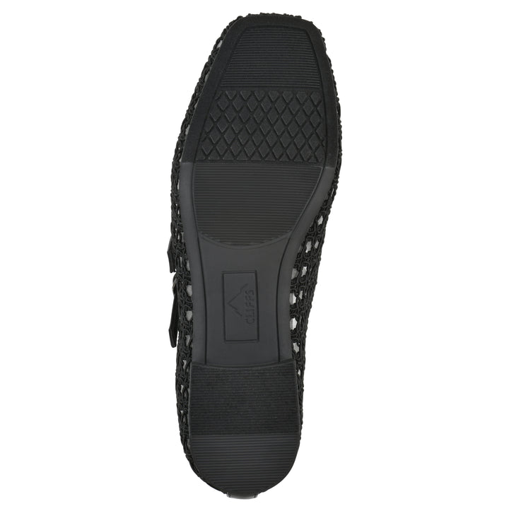 Sole view of a black mesh ballet flat with double adjustable mini straps and a black sole 