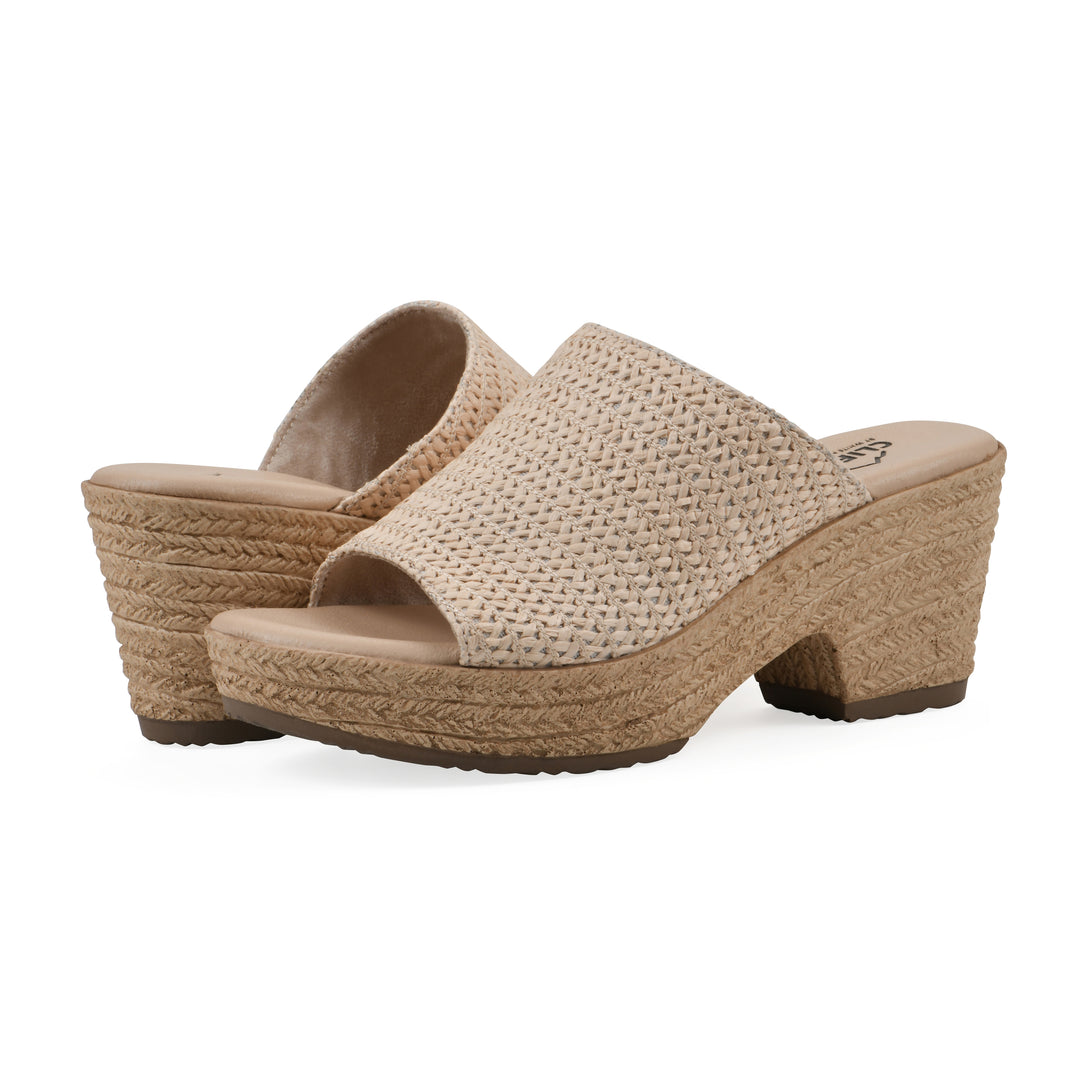 Angle view of a pair of natural raffia wedge sandals with a braided rope-style sole