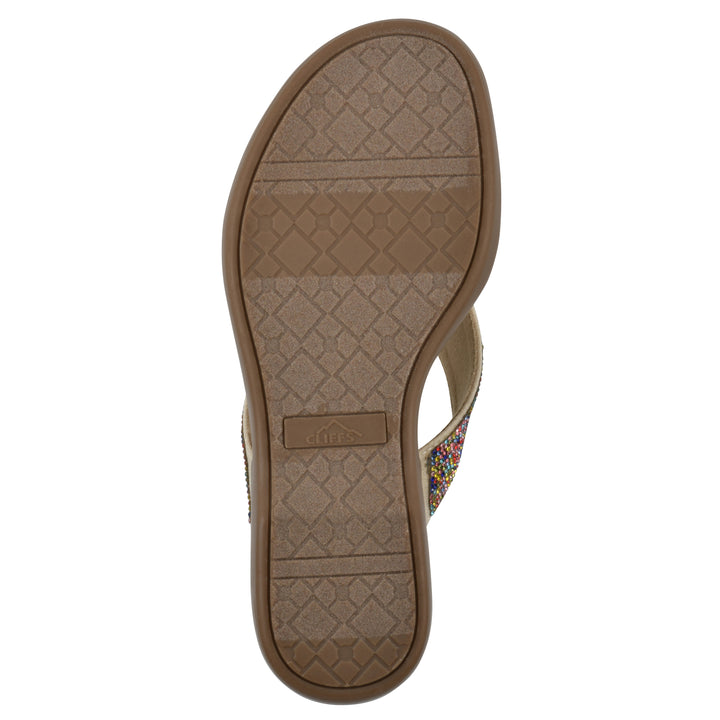 Sole view of a cushioned thong sandal with low-sheen, textured, multi-colored straps and a tan sole 