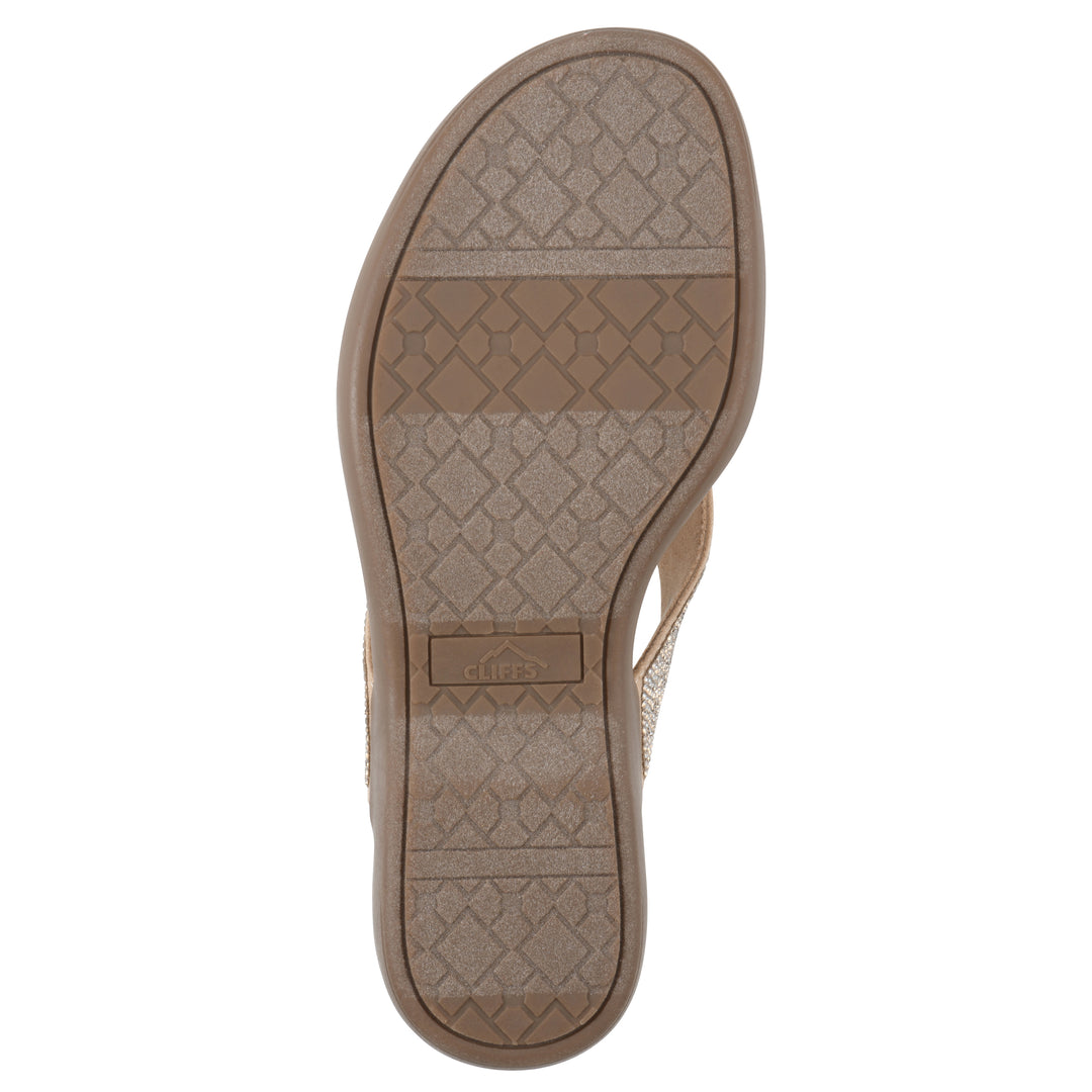 Sole view of a cushioned thong sandal with low-sheen textured gold straps and a tan sole 