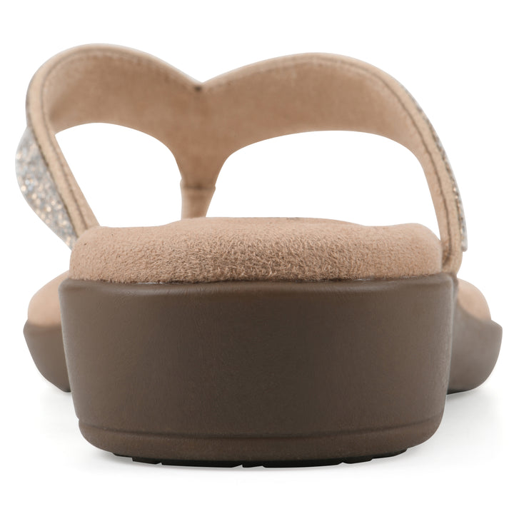 Rear view of a cushioned thong sandal with low-sheen textured gold straps and a tan sole 