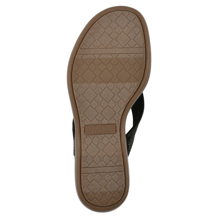 Sole view of a cushioned thong sandal with low-sheen textured black straps and a tan sole 
