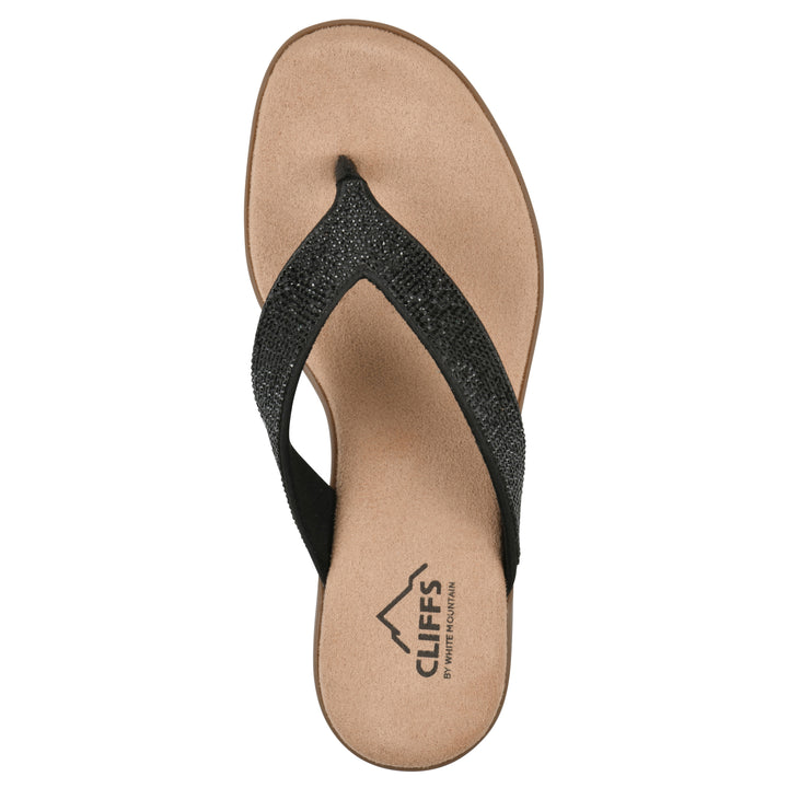 Top view of a cushioned thong sandal with low-sheen textured black straps and a tan sole 