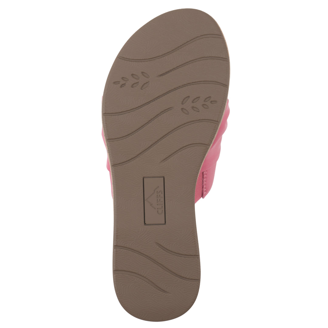 Sole view of a mauve faux leather sandal with centered twist, and cork-print sole design