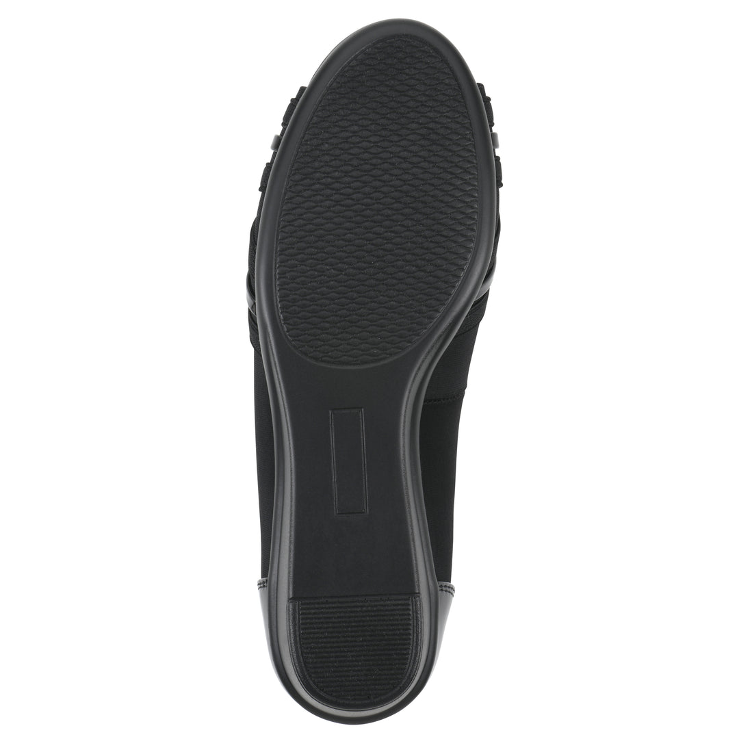 Sole view of slip-on black wedge with a peep toe