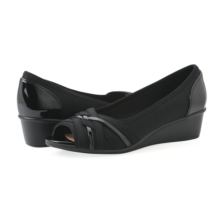 Angle view of a pair of slip-on black wedges with a peep toe