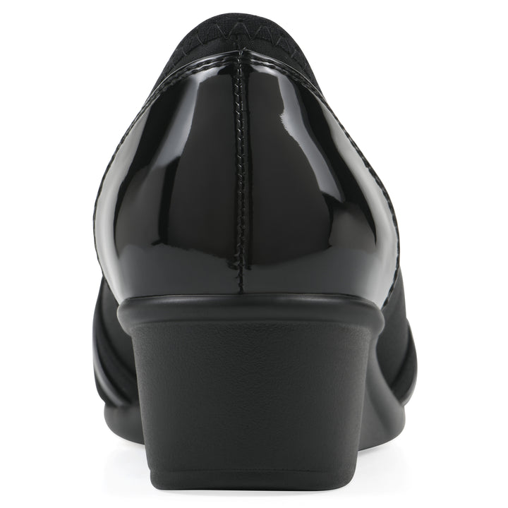 Rear view of slip-on black wedge with a peep toe
