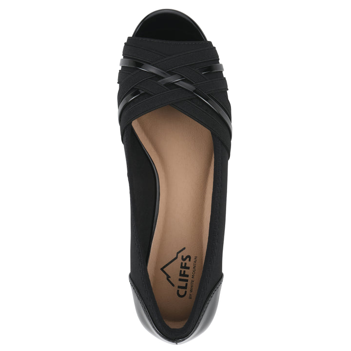 Top view of slip-on black wedge with a peep toe