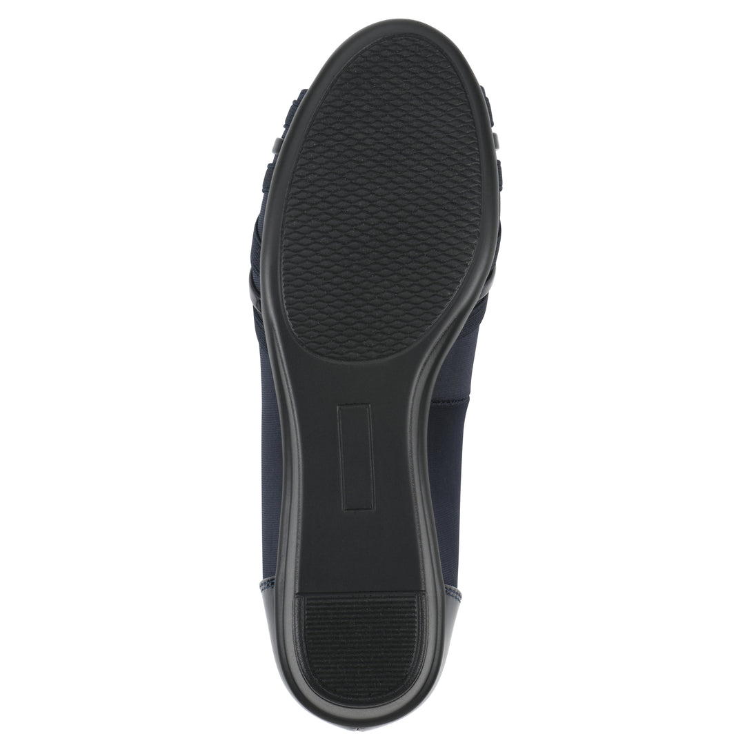 Sole view of slip-on navy wedge with a peep toe
