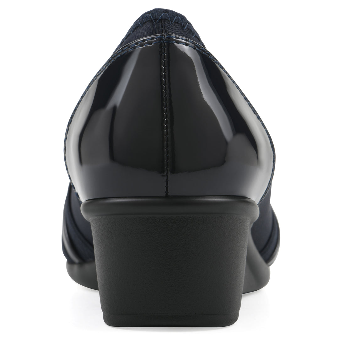 Rear view of slip-on navy wedge with a peep toe
