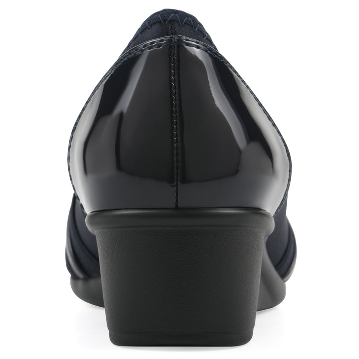 Rear view of slip-on navy wedge with a peep toe