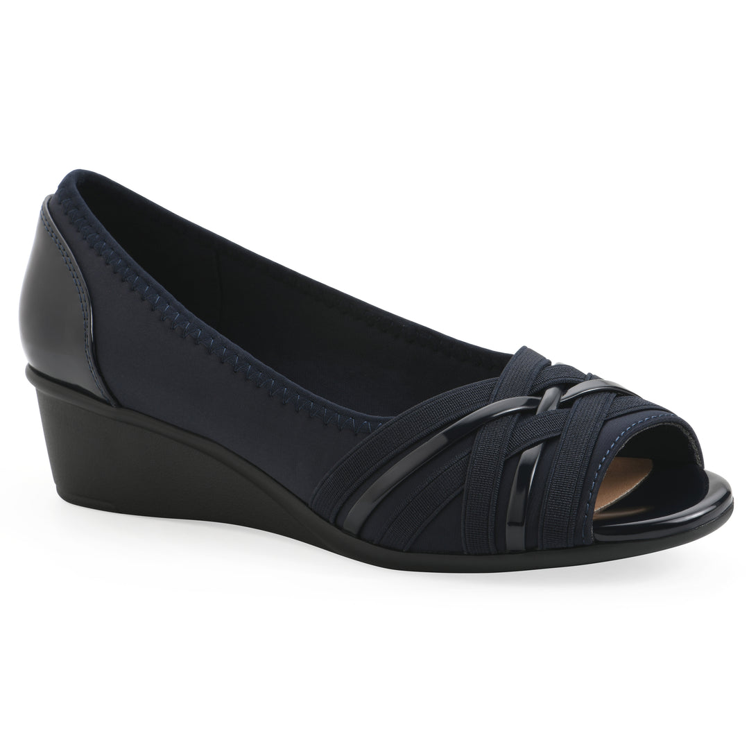 Angle view of slip-on navy wedge with a peep toe
