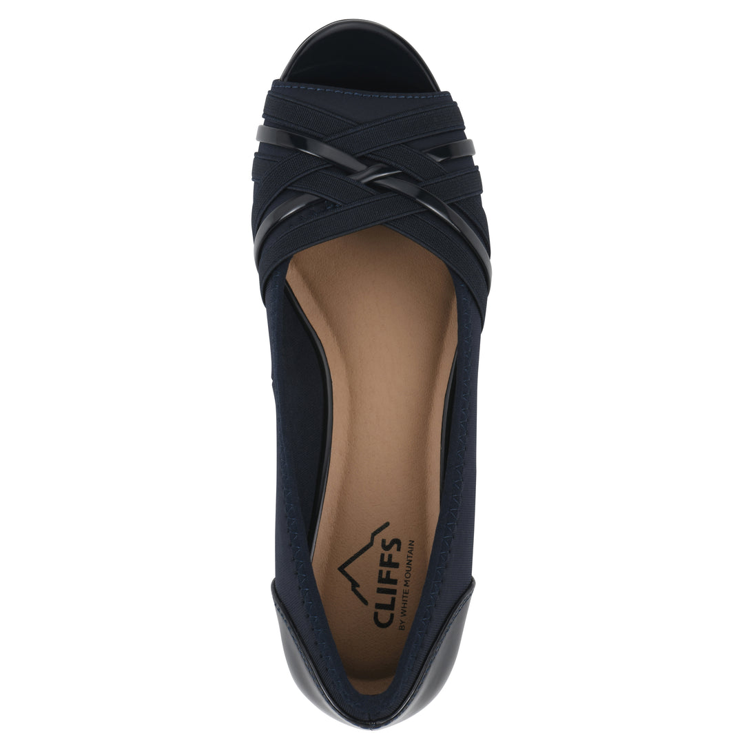 Top view of slip-on navy wedge with a peep toe