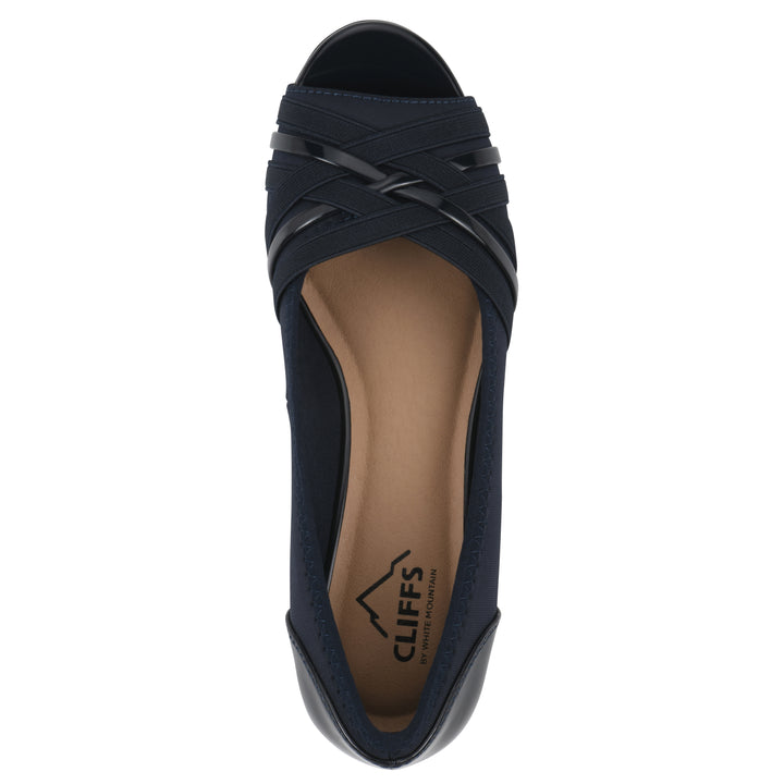 Top view of slip-on navy wedge with a peep toe