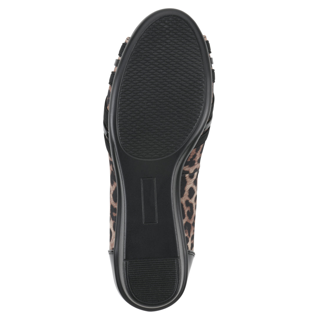 Sole view of slip-on leopard print wedge with a peep toe