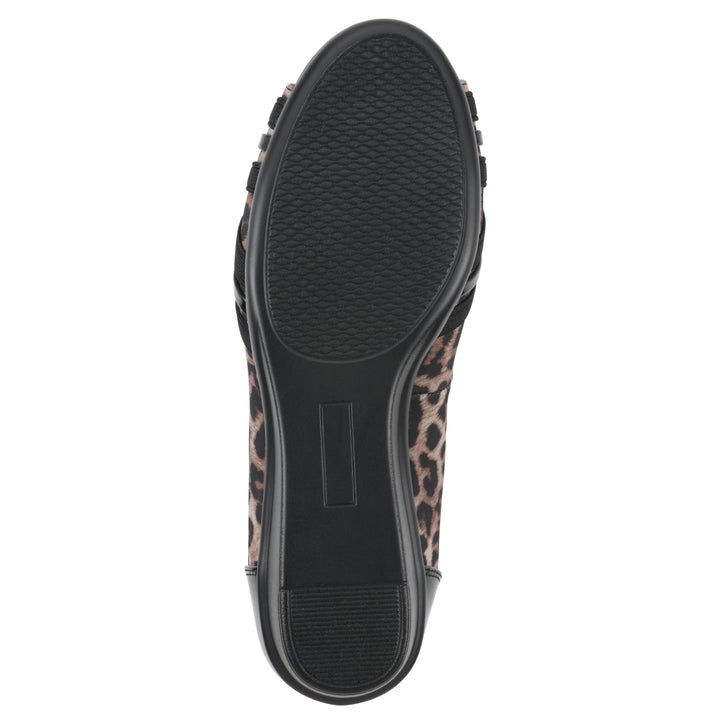 Sole view of slip-on leopard print wedge with a peep toe