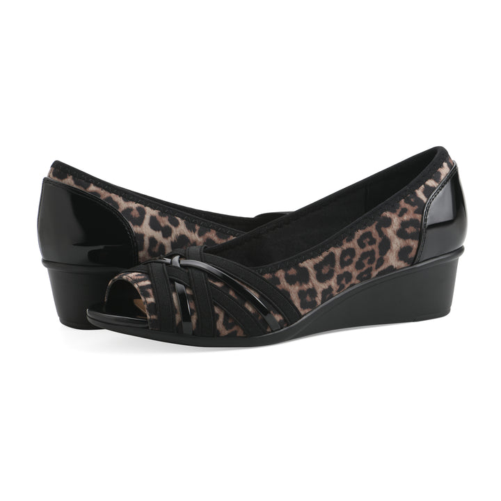 Angle view of a pair of slip-on leopard print wedges with a peep toe