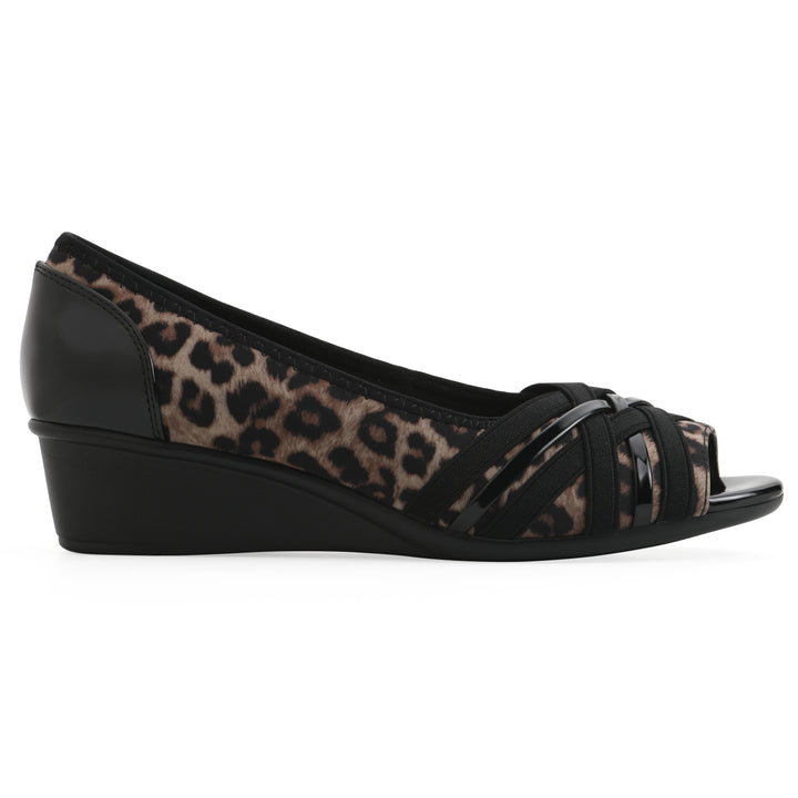Side view of slip-on leopard print wedge with a peep toe