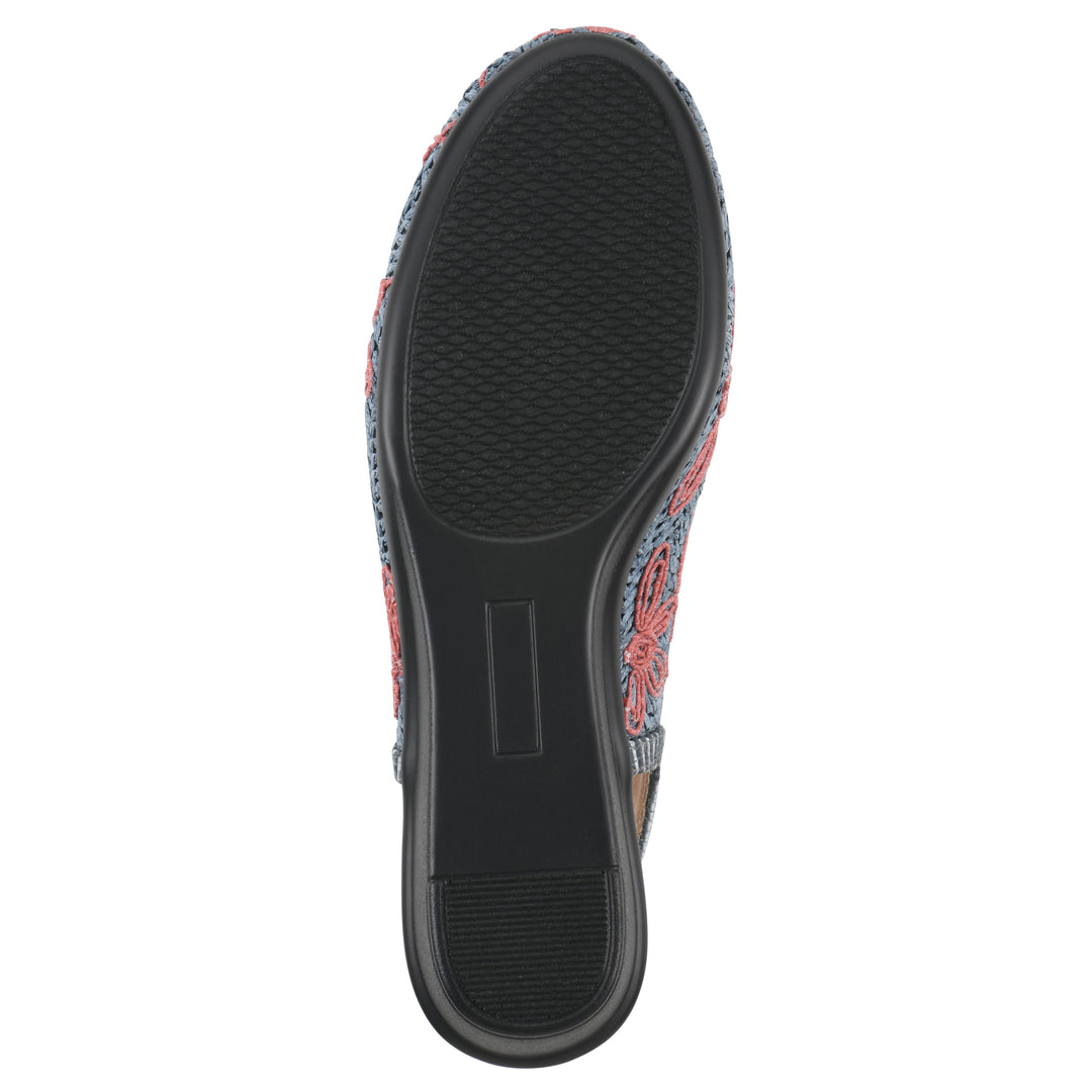 Sole view of a woven, blue, raffia slingback with muted red floral detailing and an adjustable heel strap