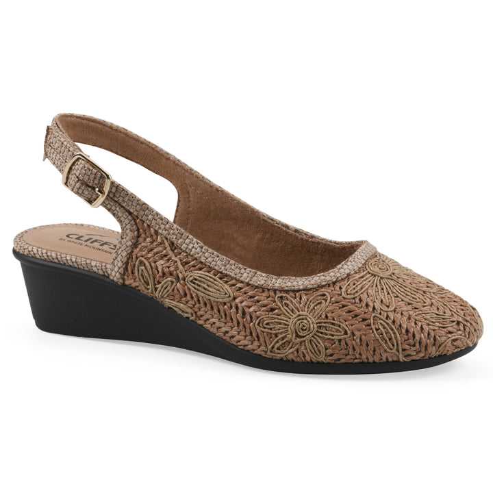 Angle view of a woven, cognac, raffia slingback with neutral floral detailing and an adjustable heel strap