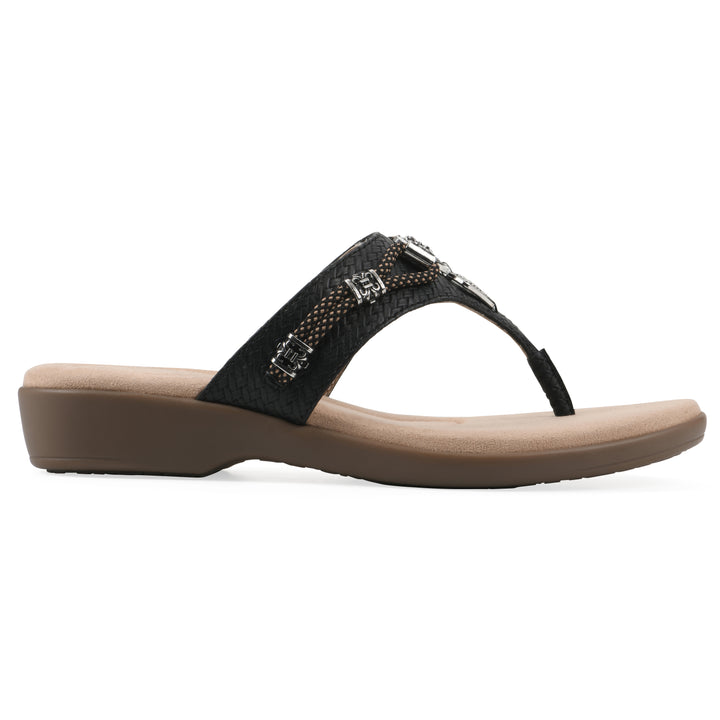 Side view of black thong sandal with silver bead embellishments and a tan sole