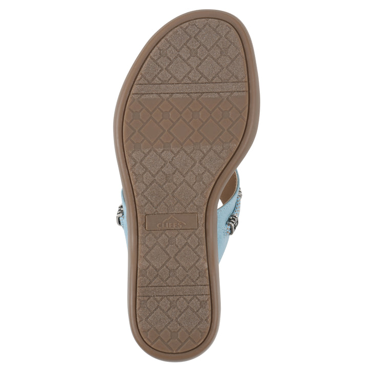 Sole view of light blue thong sandal with silver bead embellishments and a tan sole