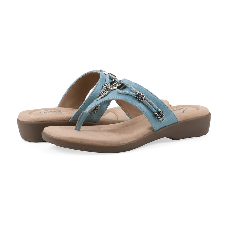 Angle view of a pair of light blue thong sandals with silver bead embellishments and a tan sole