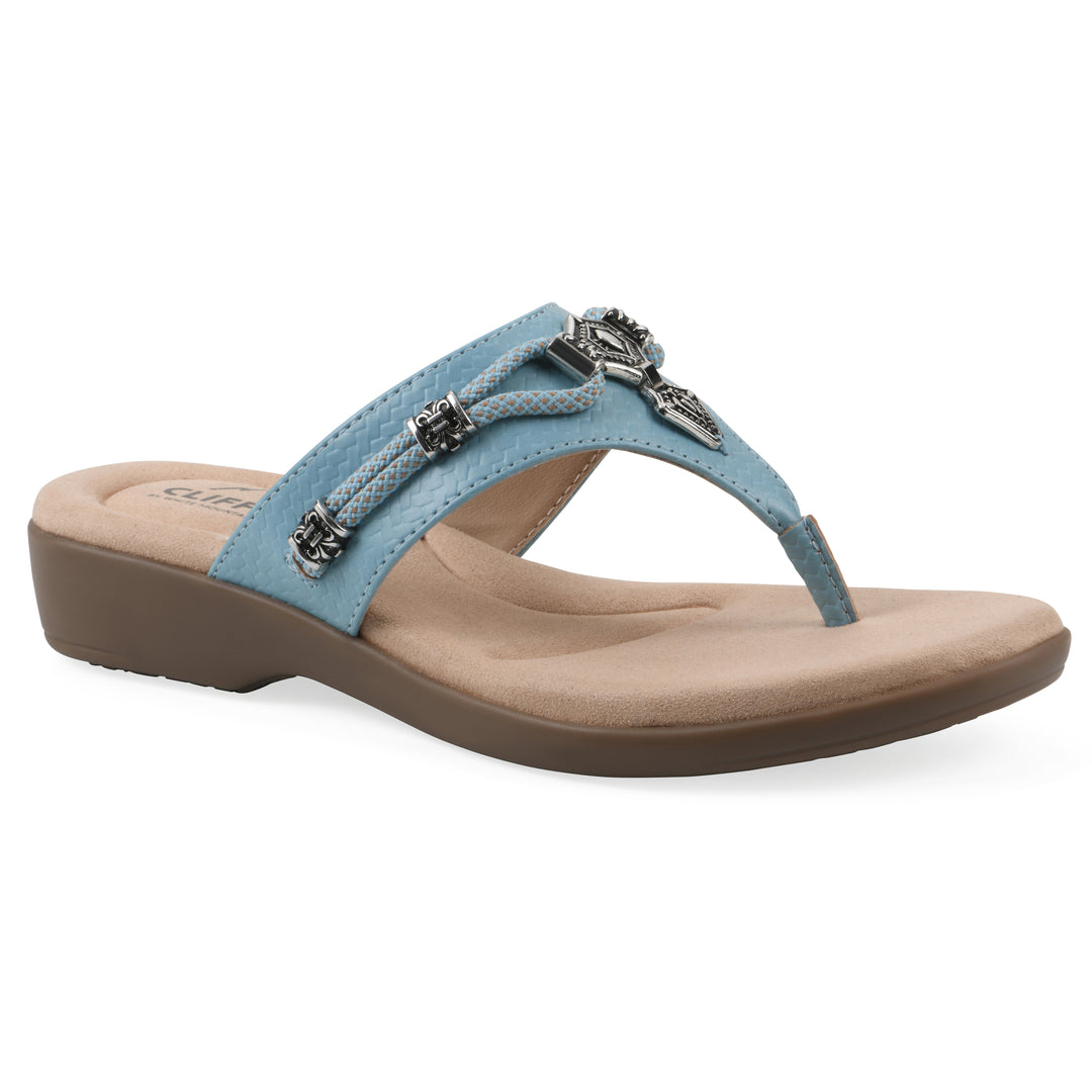 Angle view of light blue thong sandal with silver bead embellishments and a tan sole