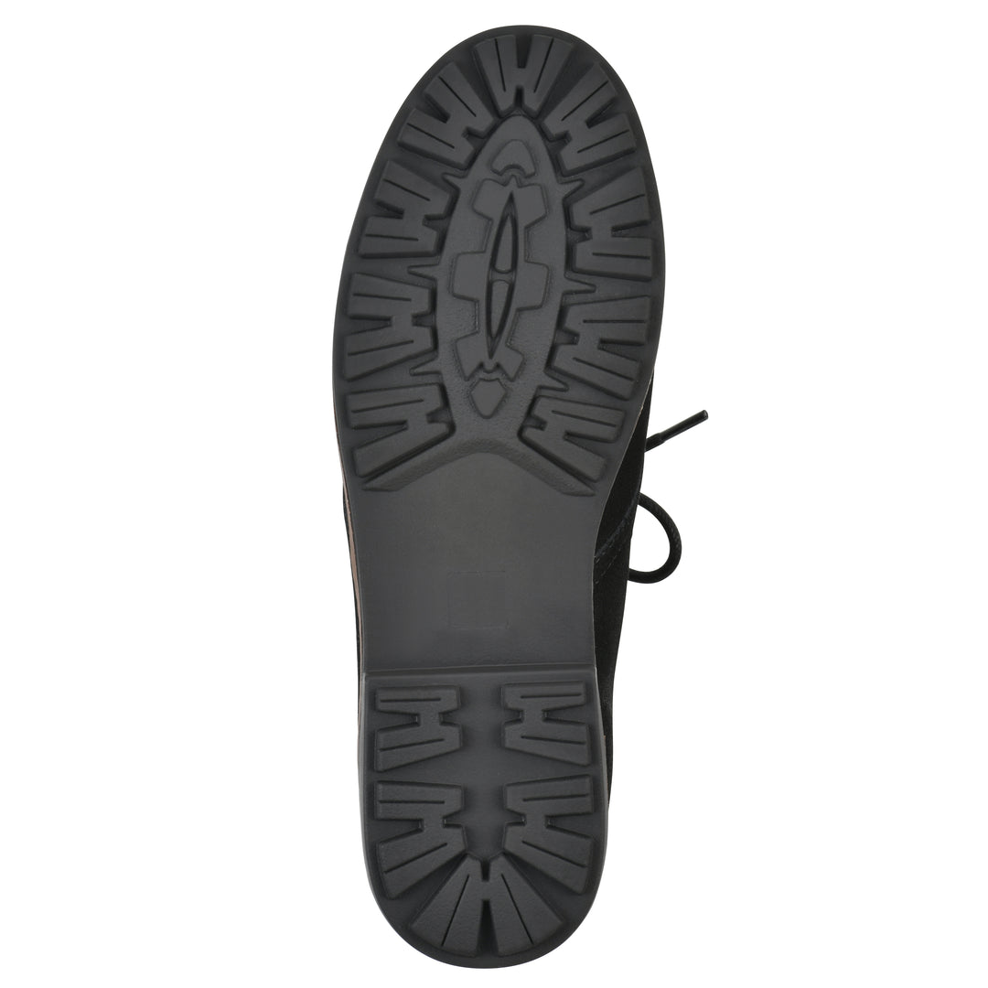 Sole view of a black suede bootie with lace-up closure and a low black heel 