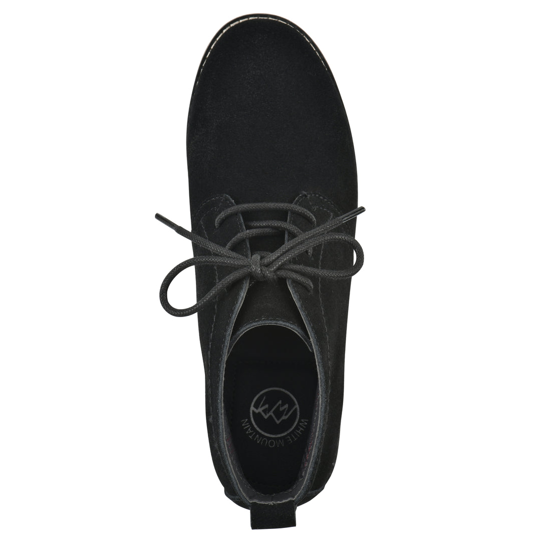 Top view of a black suede bootie with lace-up closure and a low black heel 