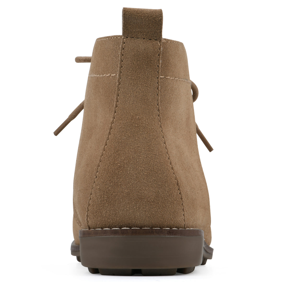 Rear view of a tan suede bootie with lace-up closure and a low heel 