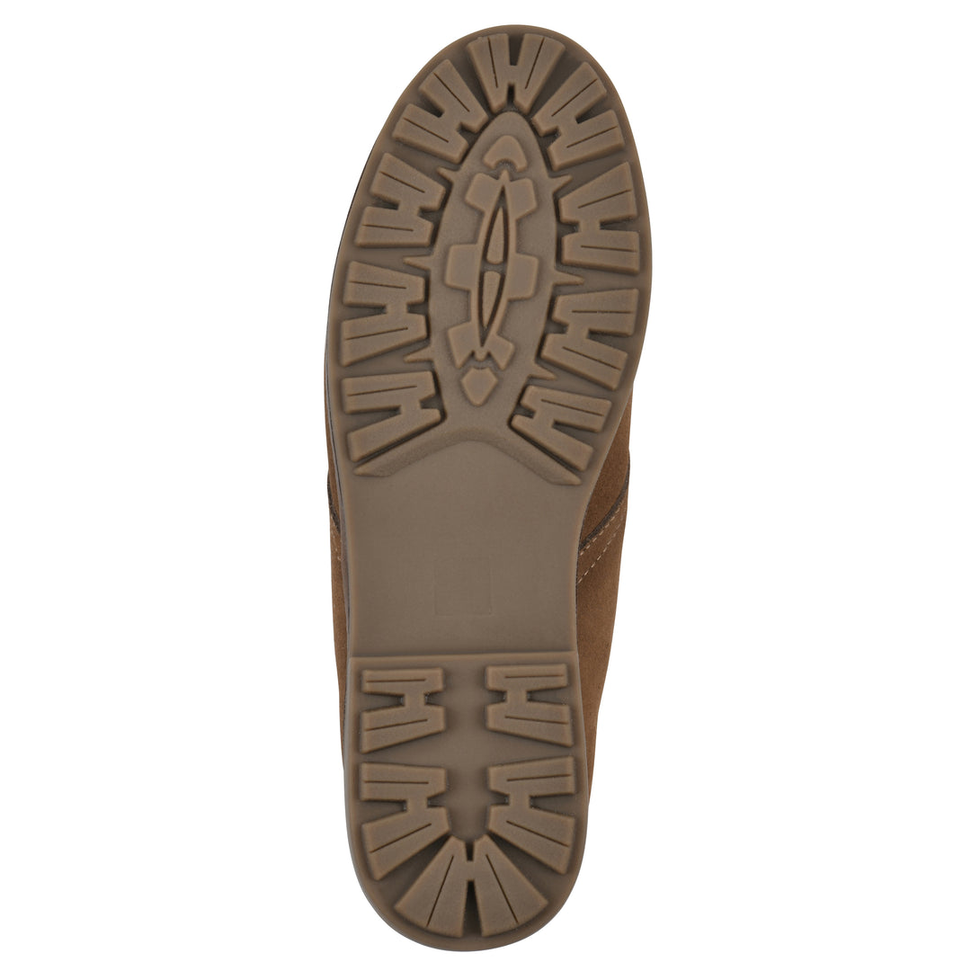Sole view of a chestnut brown suede bootie with lace-up closure and a low heel 