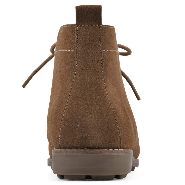 Rear view of a chestnut brown suede bootie with lace-up closure and a low heel 