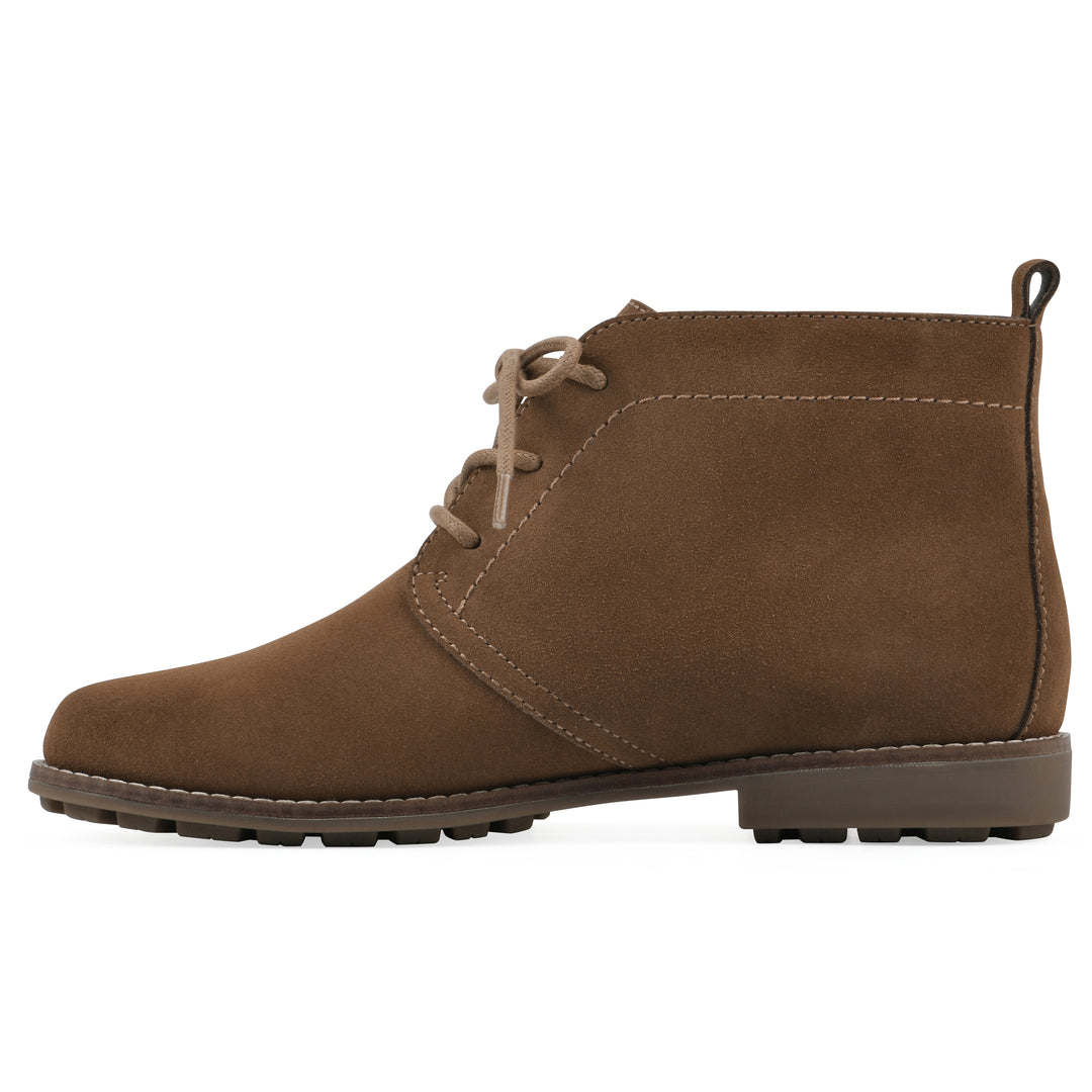 Side view of a chestnut brown suede bootie with lace-up closure and a low heel 