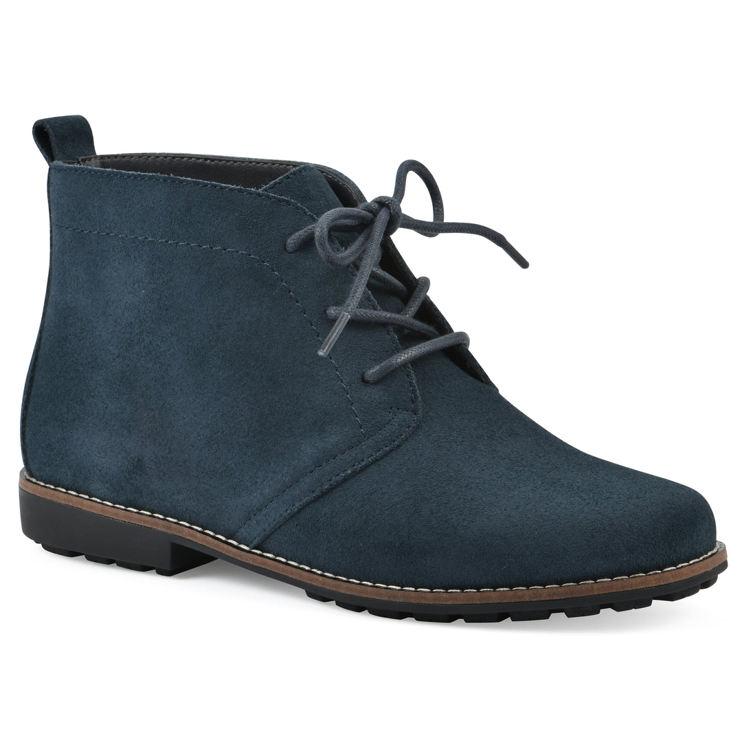 Angle view of a Navy suede bootie with lace-up closure and a low heel 