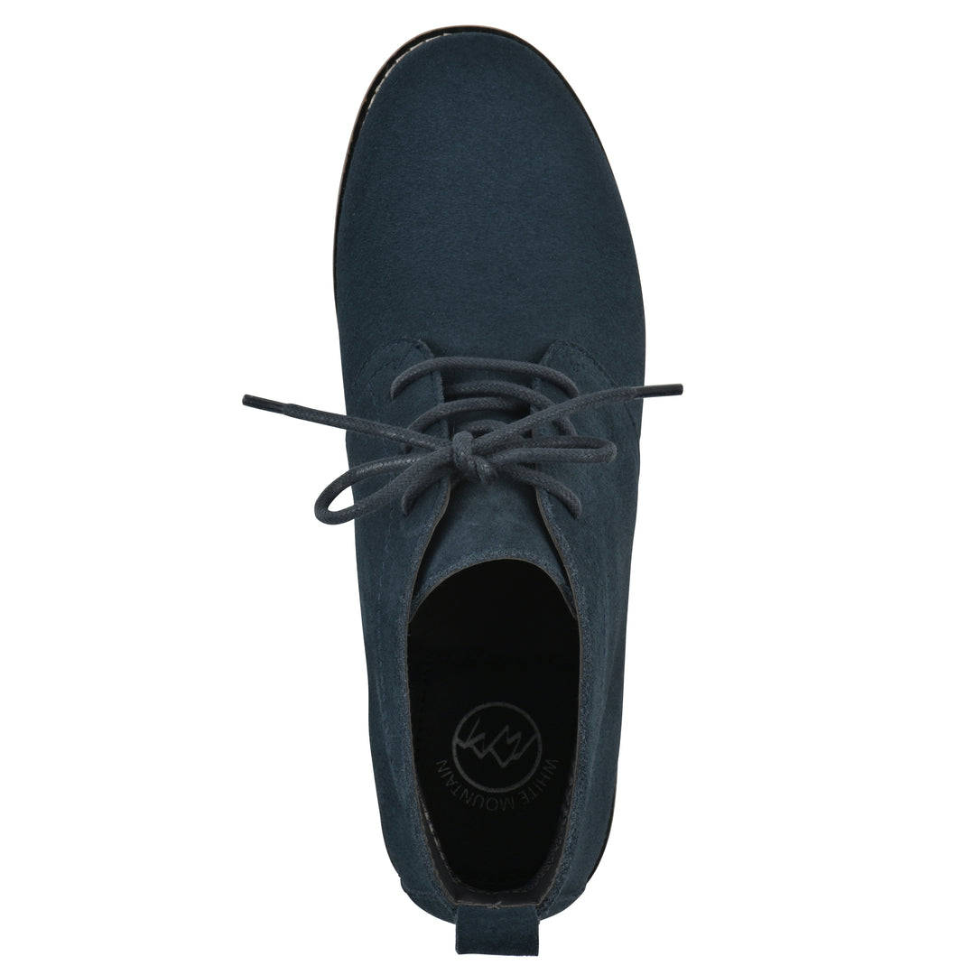 Top view of a Navy suede bootie with lace-up closure and a low heel 