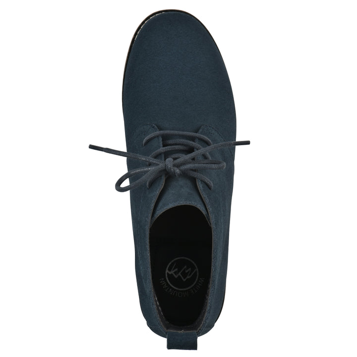 Top view of a Navy suede bootie with lace-up closure and a low heel 