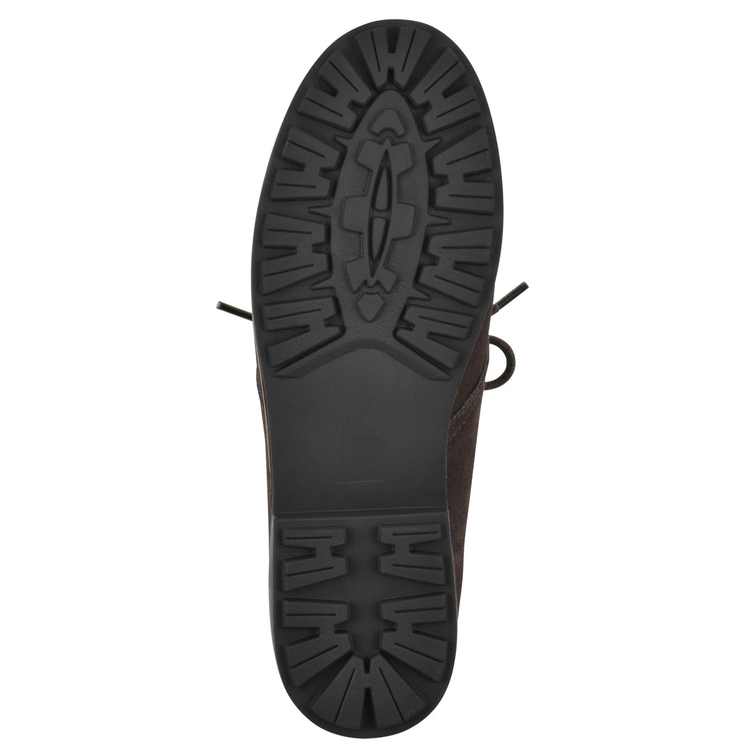 Sole view of a deep brown suede bootie with lace-up closure and a low heel 