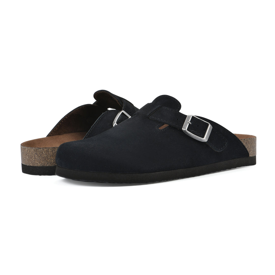 Angle view of a pair of black suede clogs with metal buckle on an adjustable strap, and a brown sole with black bottom